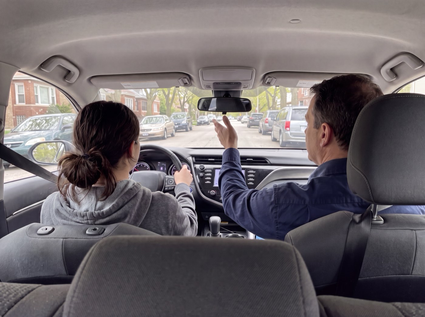 Driving lesson on a Chicago residential street